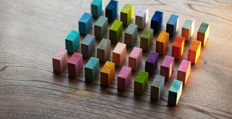 Spectrum of colorful wooden blocks aligned on a rustic old wood table. Japanese Color set....