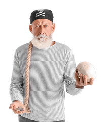 Mature bearded man dressed as pirate with coins, human skull an rope on white background