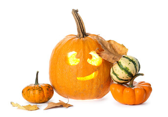 Halloween pumpkins with fallen leaves on white background
