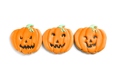 Halloween pumpkin cookies on white background