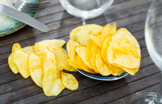 Round Plate Full Of Potato Chips Viewed From Above