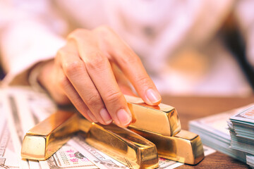 shiny gold bar arrangement in a row. Business Gold future and financial concept. concept of world...