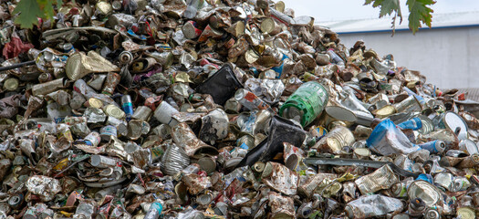 Scrap metal heap. Discarded material sorted and  prepared for recycling.