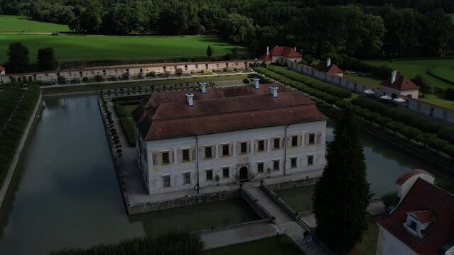 State castle Kratochv&iacute;le, picturesque renaissance residence surrounded by a moat and park, situated near Netolice, Bohemia, Prachatice district, Czech Republic-scenic aerial panorama view	
