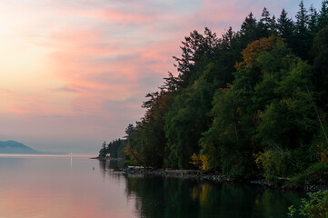Summer Sunrise in the San Juan Islands of Washington State. Beautiful pastel skies and calm seas...