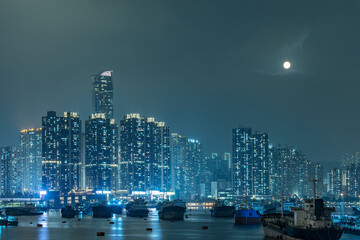 Night scenery of skyline and harbor of Hong Kong city