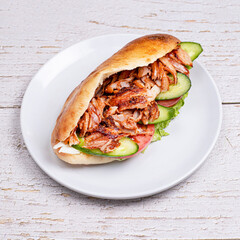 sandwich with bacon and vegetables