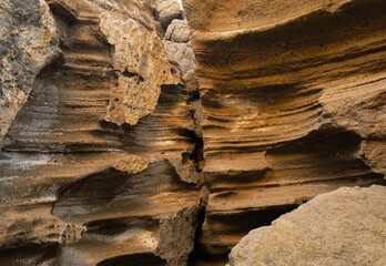eroded rocks in a slot canyon in california 