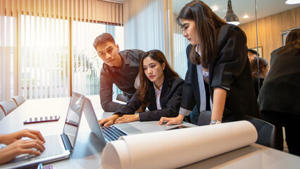 Professional Asian businessman and engineer Meeting and sharing ideas for new projects in the conference room.