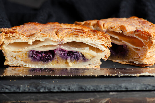 Freshly made and baked Pithivier with frangipane and blueberry