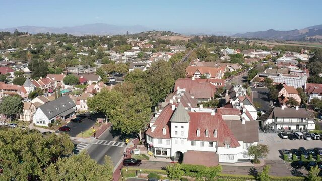 Aerial low panning shot of the quaint Danish town of Solvang in Central California. 4K