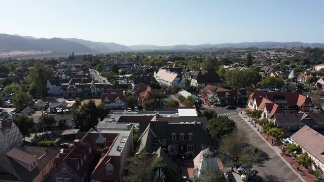 Low aerial shot flying over the quaint Danish village of Solvang, California. 4K