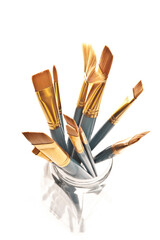 assorted painter brushes in a jar