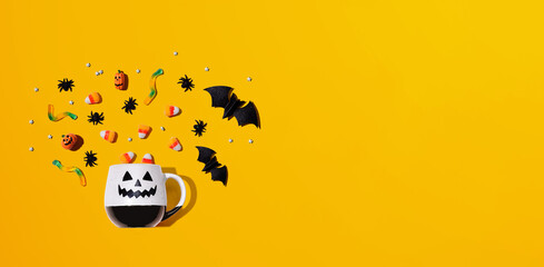 Halloween theme with ghost mug - overhead view flat lay