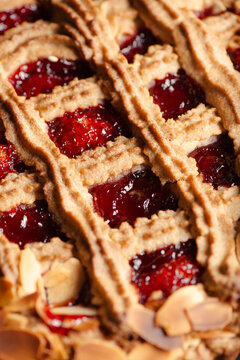 The Linzer torte is a traditional Austrian pastry, a form of shortbread topped with fruit preserves and sliced nuts with a lattice design on top.