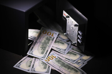Open safe in a wealthy house. Safety box in hotel room. Concept safe storage of money and documents