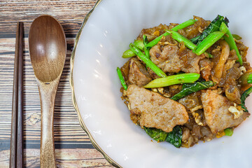 Stir fried rice noodles with soy sauce, Thai food Pad See Ew.