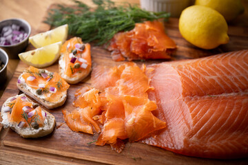 sliced cured salmon on bread with cream cheese