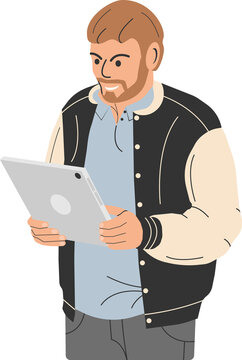 Bearded fashionable man holding tablet computer