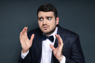 Concept of Halloween, young man on dark background