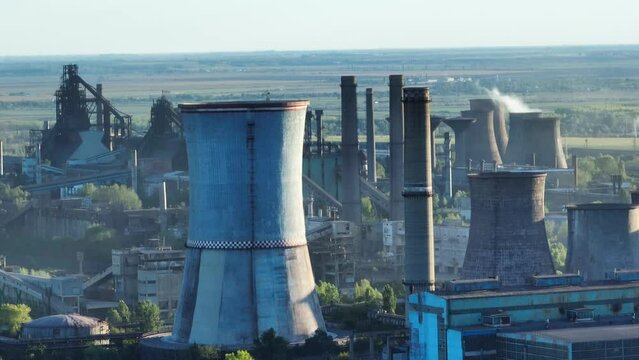 Cooling Towers And Chimneys At Eco Metal Recycling Plant In Galati, Romania. aerial ascend