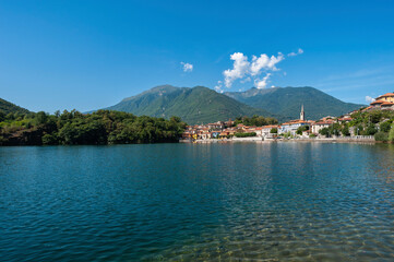 View over Lake Mergozzo to the village of Mergozzo. Province of Piedmont in Northern Italy.