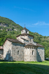 Fototapeta na wymiar Romanesque church of San Giovanni Battista in Montorfano. Province of Piedmont in Northern Italy.
