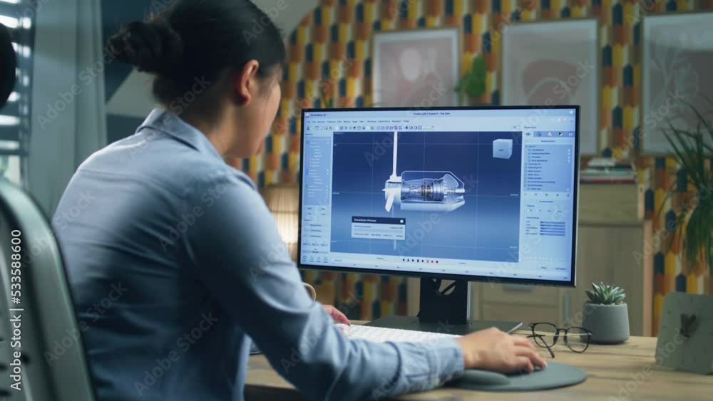 Poster asian female engineer drawing wind turbine 3d spare part in professional 3d modeling program on pc w