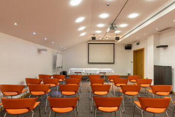 Interior of a room for presentations full of chairs