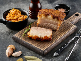 Roasted pork belly. Crispy Roast Pork Belly with stewed cabbage and spices. CLose-up