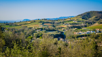  View on the hills, fields, vineyards and village of Crozes-Hermitage in Drome (France)
