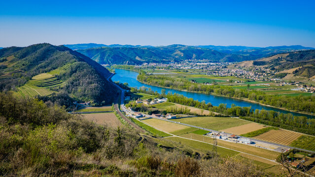 view on the Rhone river Valley, the fields, the vineyards and the Ardeche mountains from the Mejeans belvedere (Drome, France)