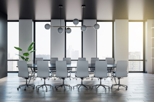 Front view on huge dark conference table with green plant and surrounded by light chairs on wooden floor in spacious meeting room with city view. 3D rendering