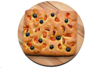 Traditional Focaccia bread served on wooden plate