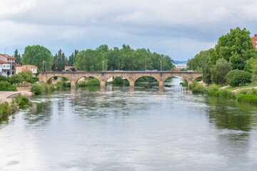 Fototapeta na wymiar Scenic view of Ebro River and French Bridge in Miranda de Ebro, Burgos, Spain