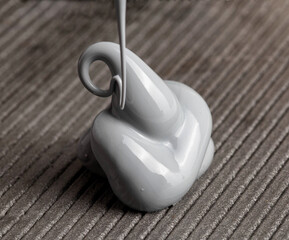 High quality automotive high temperature sealant. Gray universal one-component sealant, macro