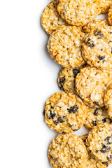 Wholegrain oat cookies. Cookies with oatmeal and raisins isolated on white table.