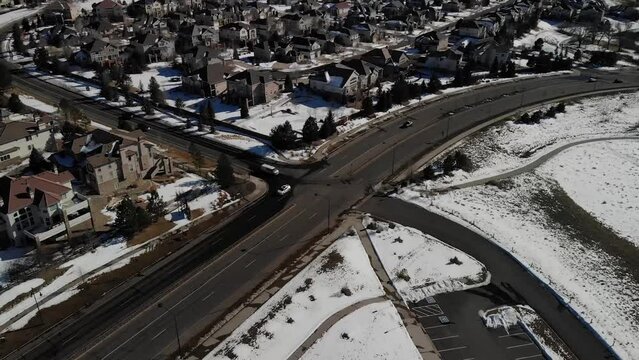 Park Next to Neighborhood in Suburbs • Playground Covered in Snow Video • HD Aerial Drone Shot in Horizontal