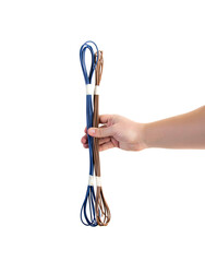 Wires with brown and blue insulation in a person's hand on a white background, isolate. Close-up