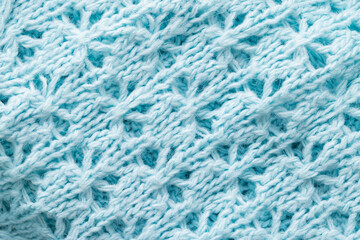 knitted winter blue sweater, handmade. Macro, fabric