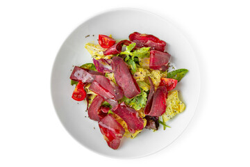 Dried dry age meat with vegetables. Balanced, nutritious, tasty and nutritious food. Ready-made menu for a restaurant or for delivery. Dish in a white plate isolated on a white background.