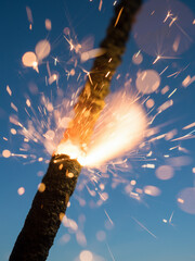 sparks on blue sky background