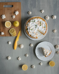 Obraz na płótnie Canvas Cheesecake with lemons on the table