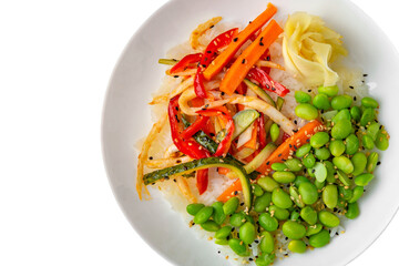 White rice with beans and cooked vegetables. Balanced, nutritious, tasty and nutritious food. Ready-made menu for a restaurant or for delivery. Dish in a white plate isolated on a white background.