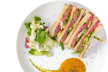 Ham sandwich. Balanced, nutritious, tasty and nutritious food. Ready-made menu for a restaurant or for delivery. Dish in a white plate isolated on a white background.