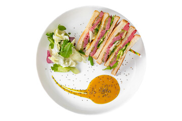 Ham sandwich. Balanced, nutritious, tasty and nutritious food. Ready-made menu for a restaurant or for delivery. Dish in a white plate isolated on a white background.