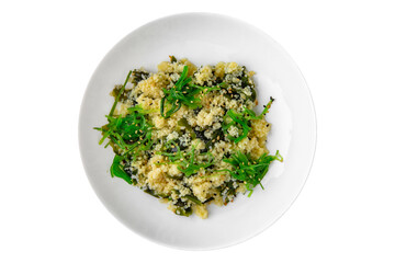 Wheat porridge or bulgur with seaweed and chukka. Balanced, nutritious, tasty and nutritious food. Ready-made menu for a restaurant or for delivery. Dish in a white plate isolated on a white