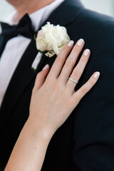 Wedding details, hands, ring exchange, champagne glasses, ring box, wedding bouquet