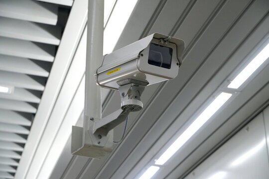 CCTV, security camera on a wall