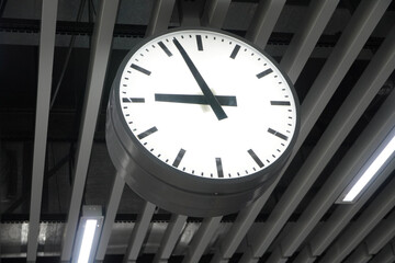 clock on the wall, in the MRT station, Jakarta